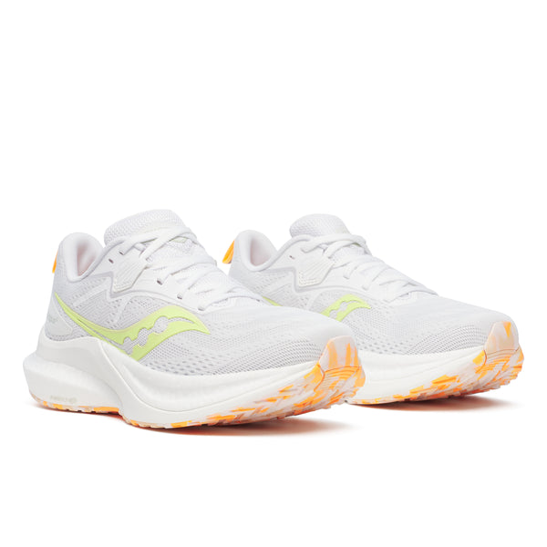 Saucony Tempus 2 Dame i White/Sunny, et par letvægtsløbesko med gule accenter og orange slidbaner for optimal stødabsorbering, vist forfra på en almindelig hvid baggrund.