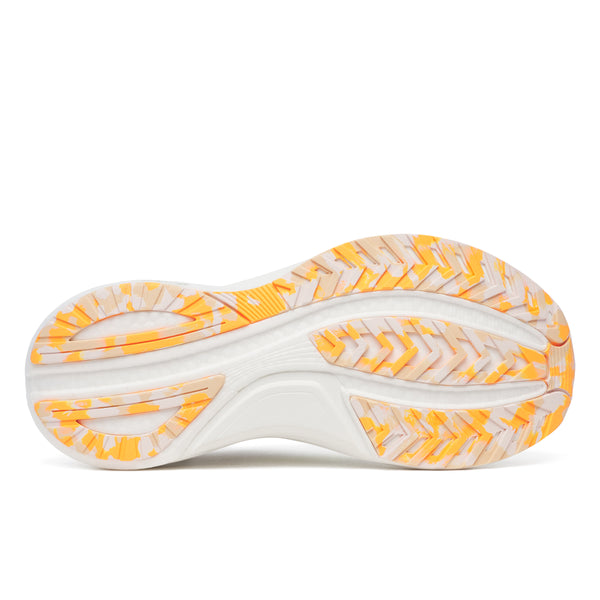 Billedet viser undersiden af Saucony Tempus 2, Dame, White/Sunny-sålen med mønstret orange og beige gummiprofil, der giver greb, stabilitet og trækkraft. Den buede svang giver stødabsorbering, og forskellige teksturerede sektioner forbedrer ydeevnen.