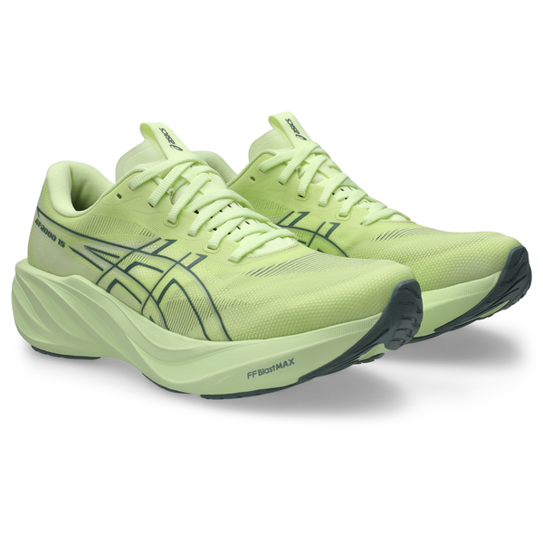 Et par ASICS GT-2000 15 herreløbesko i farverne Illuminate Yellow og Foggy Teal med tykke såler, sorte detaljer og ASICS-logoet på siderne. Disse stabilitetssko er afbilledet i en vinkel, så både ydersiden og fronten kan ses.