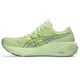 Set fra siden har ASICS Gt-2000 15, Herre i farvekombinationen Illuminate Yellow/Foggy Teal en tyk sål, snørebåndsdesign og et ASICS-logo med mørk kontur på siden. Teksten »3D GUIDANCE SYSTEM« er synlig på mellemsålen tæt på hælen og fremhæver skoens stabilitetsfunktioner, der er designet til at give optimal støtte.