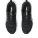 Et par Asics GT-1000 14 GS løbesko til børn i sort/stålgrå, set ovenfra med sorte snørebånd, hvide såler og synligt Asics-logo på pløs og indersål. Med GEL-dæmpning for ekstra komfort.