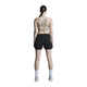En person med langt tilbagestrøget hår står med ansigtet vendt mod en hvid baggrund iført On 3" Performance 2/1 Shorts, Dame, Black - ideal træningstøj for løb dame - sammen med en sports-bh, hvide sokker og sportssko.