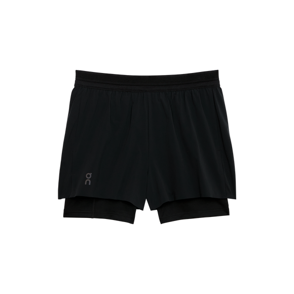 On 3" Performance 2/1 Shorts til damer i sort har et lagdelt design, elastisk linning og et lille logo på venstre ben - ideelt til træningstøj eller løb. Vises på en almindelig hvid baggrund.