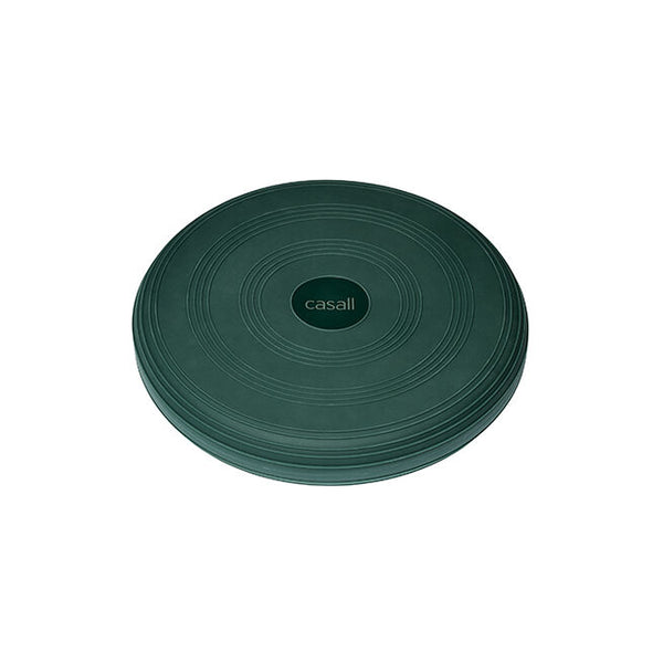 En rund Casall Balance Cushion, Unisex, i mørk blågrøn med koncentriske cirkler og "casall" i midten - ideel til genoptræning og core-træning - vist på en hvid baggrund.