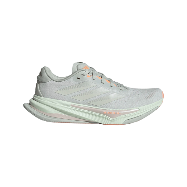 En Supernova Prima 2 Dame Wonsil/Cryjad/Beaora adidas løbesko med en tyk mintgrøn sål og ferskenfarvede detaljer på snørebånd og mellemsål samt tre sidestriber, vist fra siden på en hvid baggrund.