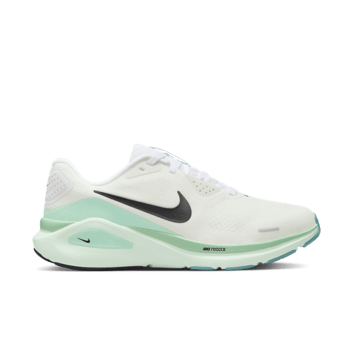 Nike Structure 26 løbesko dame i White/Black-Barely Green-Mint Foam har en mintgrøn sål, hvide snørebånd, sort swoosh og synlig luftpude i hælen for stabil løbesko performance. Vist i profil på en hvid baggrund.