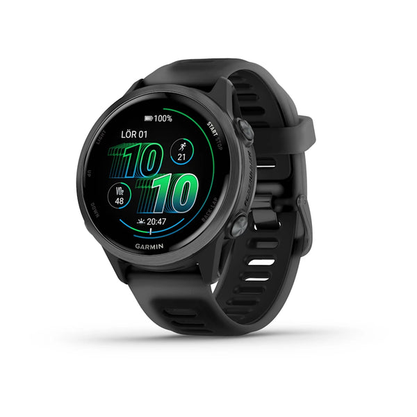 Garmin Forerunner 570 42 mm smartwatch i Slate Grey Aluminium/Translucent Black viser tid, dato, batteri og fitnessstatistik. Med avanceret GPS-sporing og en sporty silikonerem vises det på en hvid baggrund.