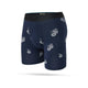 Stance Petite Bloom Wholester Herre boxershorts i navy har en sort linning og et hvidt blomstermønster over det hele, som vises på en almindelig hvid baggrund.