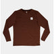 Saysky Statement Pace Long Sleeve til mænd i rød er vist fladt på en hvid baggrund og har et lille hvidt rektangulært mærke med et sort stjernelogo og tekst på venstre bryst.