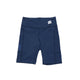 Et par Saysky W Motion+ Short Tights 9" til kvinder i blå med sidelommer, synlige sømme og en hvid logopatch på linningen - ideelle blå træningstøj til enhver aktiv garderobe. Vist mod en almindelig hvid baggrund.