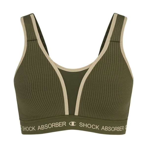 Shock Absorber Ultimate Run Bra Padded til kvinder i grøn har beige kant, meshpaneler, brede stropper og et støttende nedre bånd med SHOCK ABSORBER-logo. Designet til maksimal støtte og stil under sportslige præstationer.