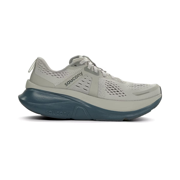 Saucony Guide 18 Herre i Fossil/Dusk har en overdel i lysegråt mesh, en tyk PWRRUN-mellemsål i mørk blågrøn, snørelukning og branding i siden. Vist i profil mod højre på en hvid baggrund.