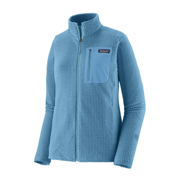 Patagonia R1 Air Jacket til kvinder i Shore Blue er en teknisk fleecetrøje med fuld lynlås, struktureret mønster, høj krave og en brystlomme med lynlås på venstre side, markeret med Patagonia-logoet over lommen.