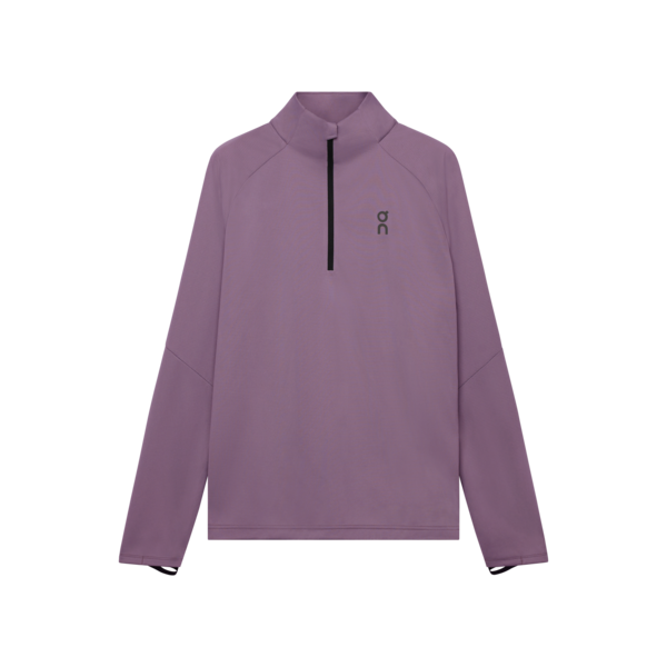 On Climate Shirt, Herre, Dewberry er en lyslilla langærmet træningstop med halv lynlås foran og et lille sort On-logo på venstre bryst, vist på en almindelig hvid baggrund.