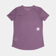 En kortærmet W Reactive Flow T-Shirt, Dame, Purple Aop fra Saysky ligger fladt med bagsiden opad. Den har et lille rektangulært hvidt mærke med en sort stjerne nederst til højre - perfekt som din nye træningstee.
