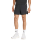 En person i sort T-shirt, Adidas Adi365 Shorts, Herre, Black med hvide striber, hvide strømper og hvide sneakers står på en ensfarvet baggrund - ideel til løb og fitness.