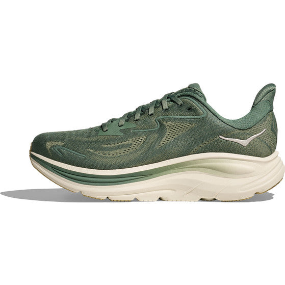 Hoka Clifton 10 herre løbesko i Fern/Truffle Salt har mesh-overdel, snørelukning, hvid mellemsål for maksimal dæmpning og mønstret ydersål. Vist fra siden på hvid baggrund og inspireret af Clifton 10's komfortfokus.