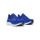 Et par Saucony Triumph 23 Herre løbesko i Lapis/Silver med overdel i mesh, hvidt bølgedesign og hvide og sorte såler, designet til maksimal komfort, vist på en almindelig hvid baggrund.