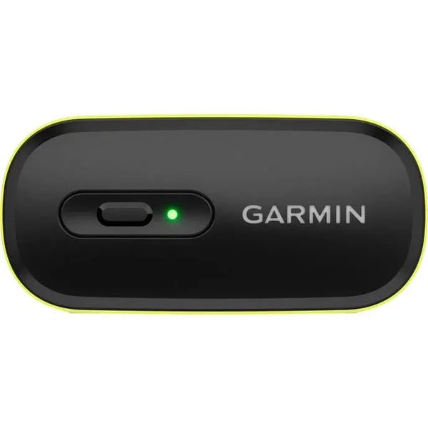 En sort Garmin HRM 600 M-XL pulsmåler til unisex, set ovenfra, har en grøn indikatorlampe, en kontakt, afrundede kanter, en tynd gul kontur og Garmin-logoet trykt på højre side.
