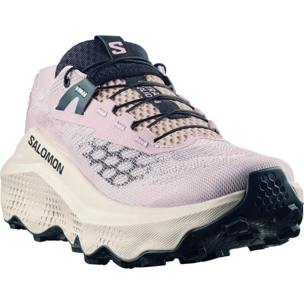 Salomon Ultra Glide 4 Dame i Shadow Grey/Tapioca/Black er en trailsko med en tyk, struktureret sål for komfort og stabilitet, sorte snørebånd, overdel i mesh og logo på siden - vist forfra.