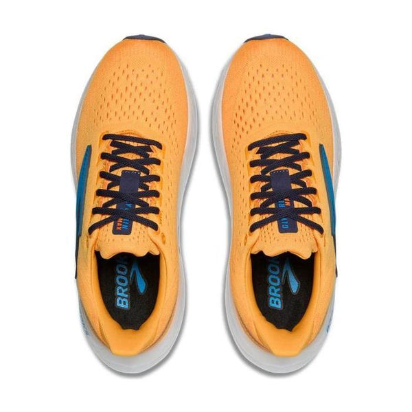 Et par Brooks Glycerin Max herre løbesko i Blazing Orange/Blue/White vises oppefra på hvid baggrund. Indersålerne har "BROOKS" i blå, hvilket fremhæver deres design for maksimal komfort.