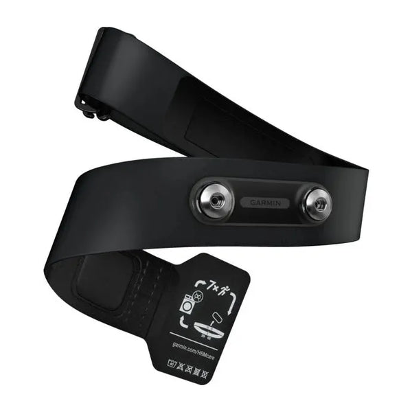 Et sort Garmin HRM 600 M-XL Pulsmålere pulsbælte til unisex, med metalstik og et instruktionsmærke med pulsmåling og plejesymboler, er vist sammenrullet på en hvid baggrund.