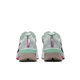 Bagside af Nike ZoomX Vaporfly Next% 4 til mænd i White/Black-Hyper Pink-Mint Foam, med reflekterende hælstribe, sort Swoosh, responsivt ZoomX-skum og innovativ carbonplade-teknologi.