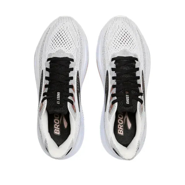 Brooks Ghost 17 Dame i White/Black/Rose Gold har sorte snørebånd, BROOKS-brandede indlægssåler og DNA LOFT v2-støddæmpning. Vist ovenfra på en hvid baggrund - ideel løbesko dame til komfort og stil.