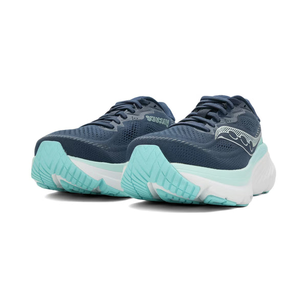 Et par Saucony Guide 19 Dame løbesko i Navy/Aqua er vinklet, så de viser front- og sideprofiler - perfekt til løbere, der ønsker støtte mod overpronation.