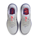 Nike Structure 26 Dame løbesko i Summit White/Wild Grape-Amethyst Tint har små indersåler med forskellig tekst, rødt Nike-logo på tungen og giver forbedret stabilitet til dine løbeture.