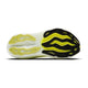 Billedet viser sålen på en Brooks Glycerin Max, Dame (Sunny Lime/Black/White), en neutral løbesko, der er kendt for maksimal komfort, med en bølget sort og gul slidbane på hvid. "BROOKS" er synlig på den sorte hælsektion.