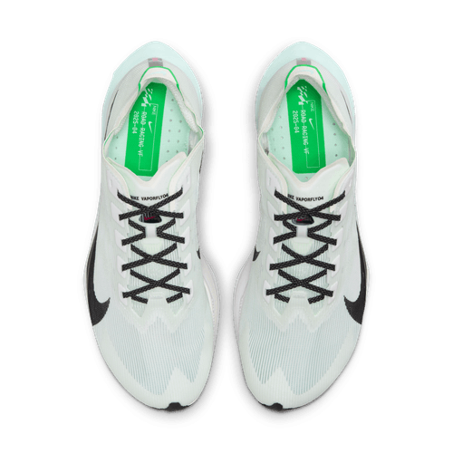 En top-down-visning af Nike Zoomx Vaporfly Next% 4 Dame i White/Black-Hyper Pink-Mint Foam viser skoene side om side på en hvid baggrund med sorte accenter, sorte snørebånd, grønne indlægssåler og ZoomX-skumdæmpning.