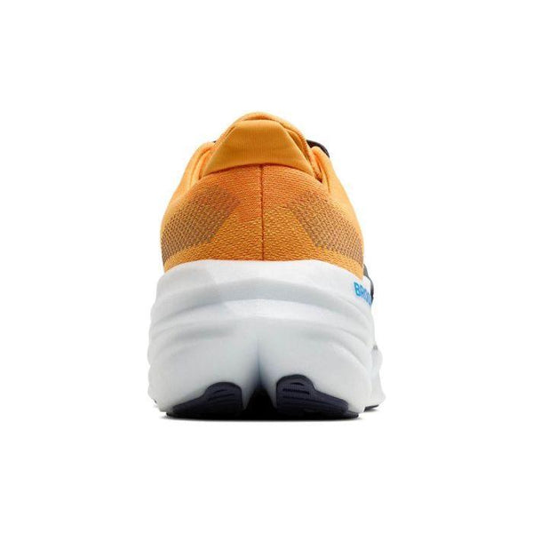 Et nærbillede bagfra af Brooks Glycerin Max, Herre, i Blazing Orange/Blue/White med en tyk hvid sål vises mod en almindelig hvid baggrund for maksimal komfort.