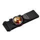 Orbiloc Run Dual, Unisex, 119 Amber er et sort armbånd med et rundt gult LED-lys og en central knap. Det er mærket "Orbiloc" og er ideelt som dansk produceret løbelygte eller tilbehør til ekstra synlighed under løb.