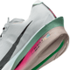 Nærbillede af hælen og sålen på Nike ZoomX Vaporfly Next% 4, Herre (White/Black-Hyper Pink-Mint Foam) med sort swoosh, grønne og pink accenter, ZoomX mellemsål, carbonplade og "NIKE ROAD RACING"-tekst på siden.
