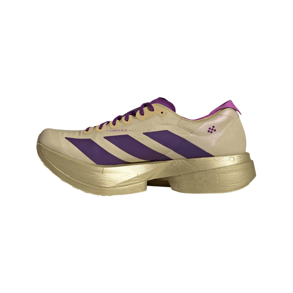Adidas Adizero Adios Pro 4, Herre i Sand/Ricpur/Goldmt har lilla detaljer og en guldfarvet sål. Denne lave løbesko er ideel som løbesko til konkurrence.