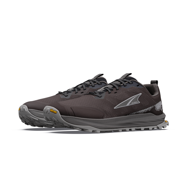 Altra Lone Peak 9+ til mænd i farven Chocolate Torte/Silver har en struktureret sål, grå snørebånd og reflekterende logoer på siderne, vist på en ensfarvet hvid baggrund.