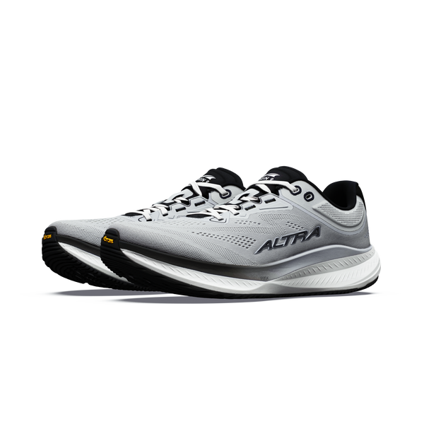 Et par Altra Torin 9 herresko til volumenløb i farvekombinationen Ultimate Grey/Black/Vapor Blue, med ALTRA-logo, Zero Drop-design, overdel i mesh, hvide mellemsåler og sorte ydersåler, vist på en ensfarvet hvid baggrund.
