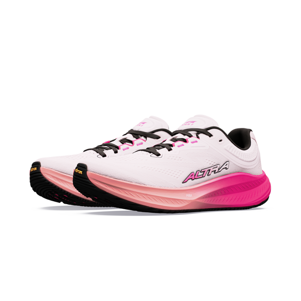 Et par Altra Torin 9 Dame-løbesko i farven Ccnt Crm/Pink Flow, med FootShape-tåkappe og Zero Drop-design, vist på en ensfarvet hvid baggrund.