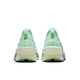 Et par Nike Alphafly Next% 3 Herre løbesko i Barely Green/Black Spruce-Volt Tint, vist bagfra med hvide ZoomX-skumsåler, lilla og neongule detaljer og trækflige ved hver hæl.