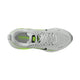 Oversigtsbillede af en hvid Nike Vomero 18, Herre, Photon Dust/Black-Volt løbesko med mesh-materiale, sort Nike-swoosh, grønne detaljer, hvide snørebånd og »VOMERO«-teksten synlig på indersålen – designet af Nike med henblik på maksimal dæmpning og ultimativ komfort.