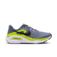 Nike Structure Plus løbesko til mænd i farverne cool grey, sort og lemon venom, med et sort Swoosh-logo på siden og en hvid, stødabsorberende mellemsål, der giver stabilitet ved overpronation.