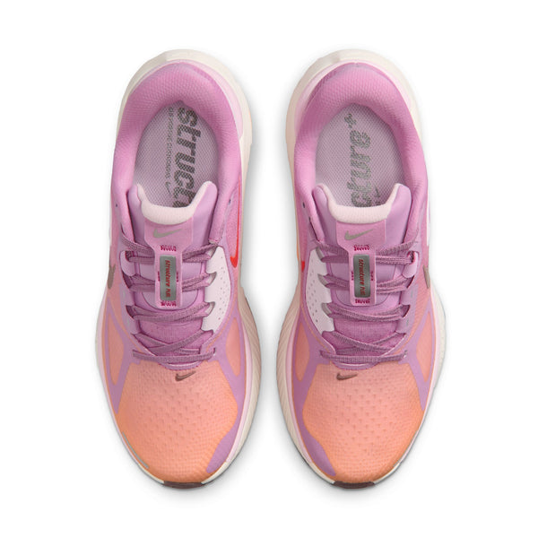 Topbillede af Nike Structure Plus Dame løbesko i Lt Magenta/Tattoo-Orange Pulse-Pink Foam, der viser en gradient fra fersken til rosa og lavendel. Designet til stabilitet og støtte med hvide mellemsåler - perfekt til løbere med overpronation.