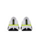 Et par Nike Pegasus 42 løbesko til mænd i farvekombinationen HVID/SORT-LEMON VENOM-HVID, set bagfra på en hvid baggrund. Designet har neon-gule (Lemon Venom) detaljer og sorte såler samt en markant sort lodret stribe med grøn tekst på hælområdet. Denne model er udstyret med en ReactX-mellemsål for øget komfort og den karakteristiske Air Zoom-støddæmpning, der giver responsiv støtte.
