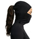 En person set i profil iført en sort Wool Running Mid-Layer Top, Dame, sort/sort/sort hættetrøje med integreret ansigtsdækning.