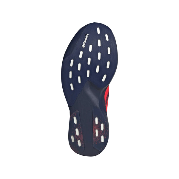 Billedet viser den mørkeblå ydersål på Adidas Adizero Evo SL Woven løbesko til damer, med hvide grebsmønstre, røde accenter og Continental-logoet. Dens buede design antyder Lightstrike Pro-teknologi til konkurrence løb.
