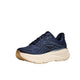 En Hoka Bondi 9 til mænd i Midnight Blue/Varsity Navy med en tyk hvid sål, lysebrun slidbane, mesh-stof, snørebånd og en subtil sidestruktur for optimal komfort, vist på en hvid baggrund.