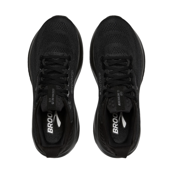 Topbillede af Brooks Adrenaline GTS 25, Dame, Black/Black/Ebony med sorte snørebånd og hvide logoer på indlægssålerne, vist side om side på en hvid baggrund - perfekt til optimal stabilitet under din løbetur.