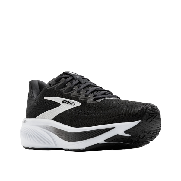Brooks Ghost 17 Dame i Black/Grey/White har et lavt snit, blød dæmpning, struktureret sål og "Brooks" på siden. Denne løbesko er sat op mod en almindelig hvid baggrund.