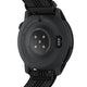 Billedet viser bagsiden af et sort COROS Pace 4 Multisport Watch (Nylon Black), mærket "PACE 4", med sensorlys, opladningsstifter og tekst, der viser funktioner som dobbeltfrekvent GNSS, puls, vandmodstand og et barometer.
